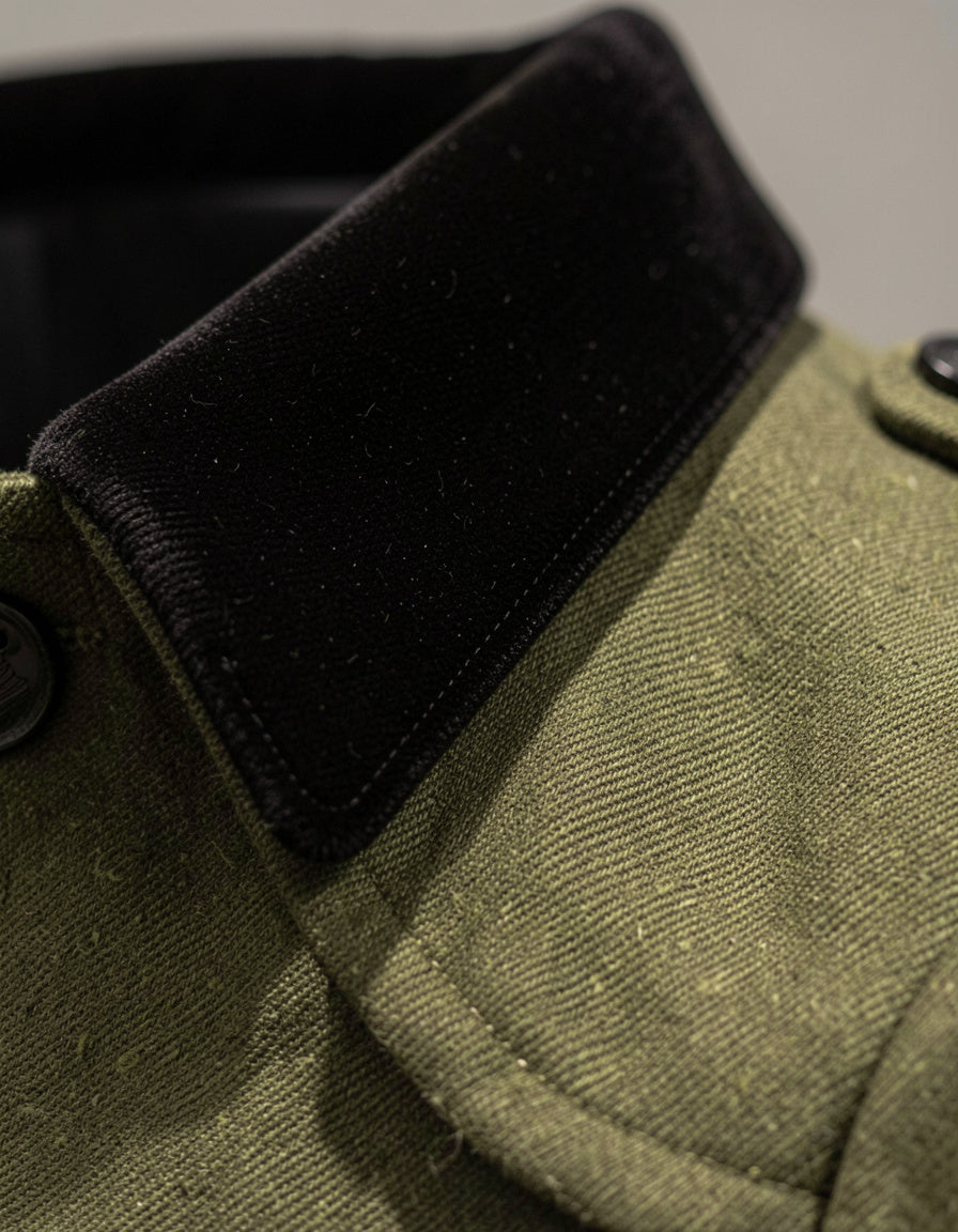 Olive coat velvet collar and button detail
