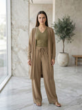 V-Neck Top, Cardigan and Pants Three-Piece Set in khaki, worn by model, marble interior